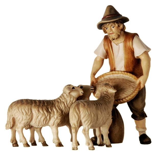 Schaffütterer mit drei Schafen - Lasiert